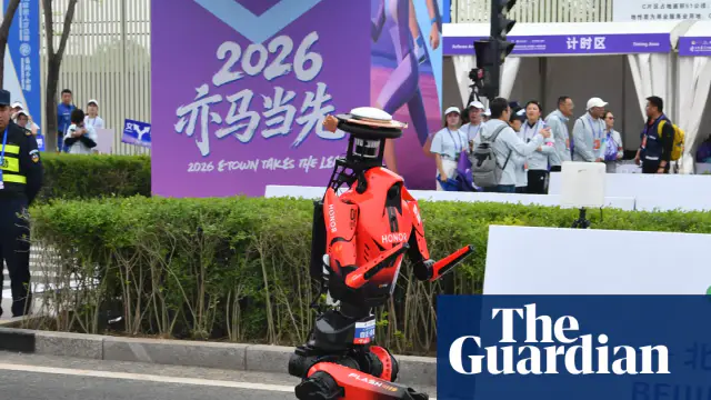 Chinese Robot Sets New 100m Sprint Record — image accompanying The Guardian Athletics's report
