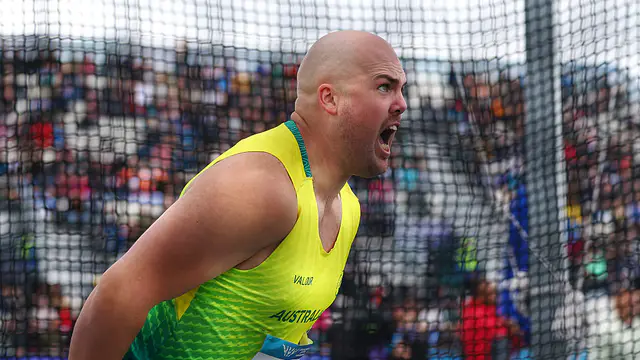 Matthew Denny defends discus title at Commonwealth Games — image accompanying Athletics Weekly's report