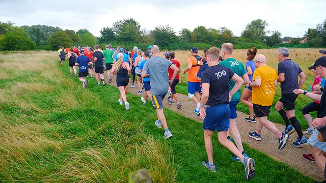 Running clubs attract more adults for fitness and community — image accompanying Athletics Weekly's report