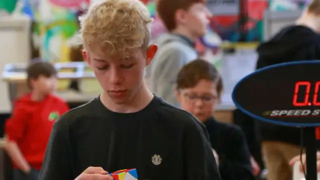 Scholey Claims Rubik’s Cube Mile Record in Toronto — image accompanying Marathon Handbook's report
